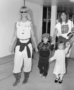 Holding Hands Prints: Goldie Hawn, American actress with son Oliver and daughter Kate