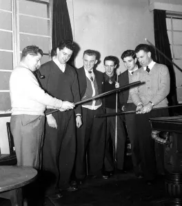Core61 Prints: Golf pro Ken geddes demonstrates some of the footballers grips with a snooker cue