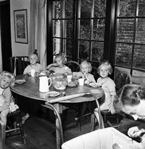 00010 Prints: Good Quads enjoying a meal at Guiders Camp, Foxlease, Hants. July 1952 C3575