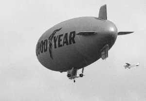 00394 Prints: The Goodyear airship Europa seen escorted by a Cessna 172 light aircraft during proving