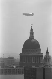 Skyline Prints: The Goodyear Airship Europa seen here passing the dome of St Pauls Cathedral