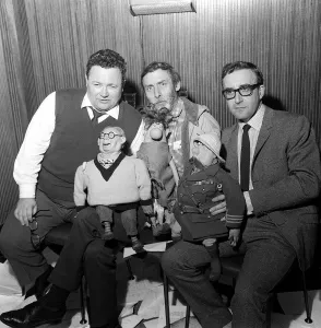 The Goons. Harry Secombe, Spike Milligan and Peter Sellers holding the tellygoons puppets