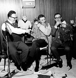 The Goons. Harry Secombe, Spike Milligan and Peter Sellers holding the tellygoons puppets
