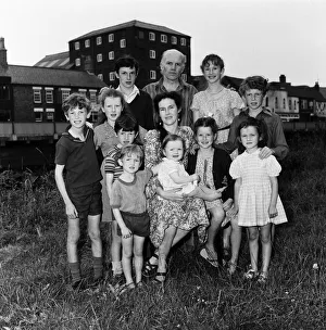 01082 Prints: Gordon Gillick with his wife Victoria Gillick and their ten children at home in Wisbech