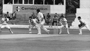 Caught Prints: Gotcha! Jimmy Love, left, grasps his safe pair of hands together to catch Somerset