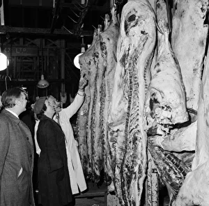 00759 Prints: Three government representatives arrived at Londons Smithfield Meat Market just