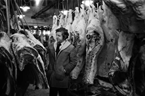 00759 Prints: Three government representatives arrived at Londons Smithfield Meat Market just