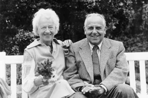 Gracie Fields Actress / Singer sitting on bench with third husband Boris Alperovici Dbase