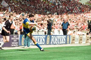 Graham Holroyd kicks for goal for Leeds during the Rugby League Cup Final at Wembley