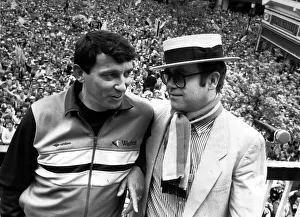 00004 Prints: Graham Taylor Watford manager shares an historic moment with his chairman Elton John