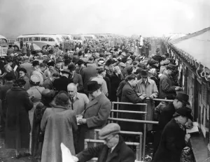 Coaches Prints: Grand National 1949 Racegoers at Aintree seen here placing their bets with the Tote
