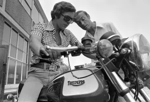 Rider Prints: Grand Prix motorcycle road racer Phil Read sits on an Norton Villiers Triumph Bonneville
