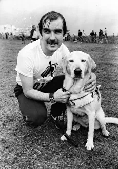 00119 Prints: The Great North Run 27 June 1982 - Blind athlete Paul Hann is re-united with his dog Whig