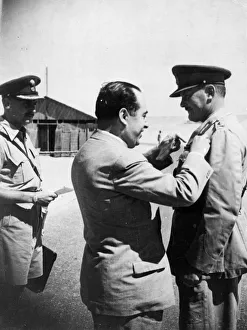 The Greek minister of war M. Dimitrakakis decorating Major General B. C
