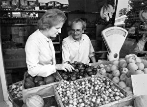 Vegetables Prints: Greengrocer. Mrs. Margaret Thatcher with greengrocer Bill Poole. March 1983 P009160