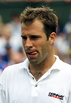 Tongue Prints: Greg Rusedski during his second round mens singles match against Arvind Parmar