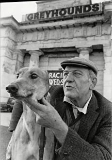 Images Dated 7th December 1988: Greyhound trainer with his dog No Stranger at the last meeting at the Derby Greyhound