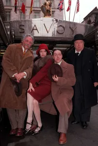 00131 Prints: Griff Rhys Jones outside the Savoy hotel January 1990 With Fellow Actors Dinsdale