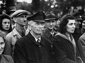 Grim faced residents of Berlin watch as the British Army pass them on their entry in to
