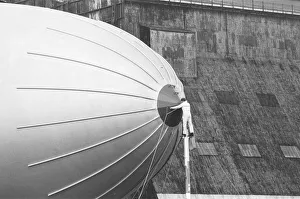 One of the ground crew prepares to detach the Goodyear airship Europa from her mooring
