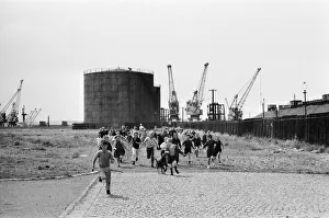 A group of children from Garston, Liverpool enjoy a day out at Sefton Park in the summer