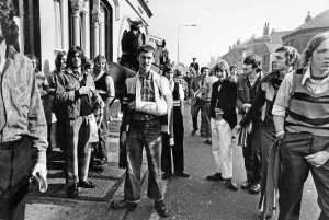 Group of football supporters gathered in the streets of Liverpool on their way to watch