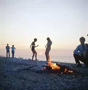 01195 Collection: Group of friends enjoying themselves during a day out at the seaside in Greece