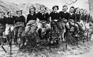 Rural Scene Prints: A group of happy looking Land Army girls pose for a group photograph during the Second