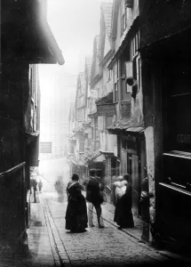 Victorian Prints: Group of people in typical central Bristol street frontage