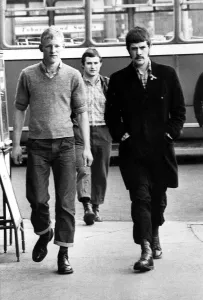 Walking Prints: A group of skinheads walking through the bus station at Newcastle on 8th June 1972