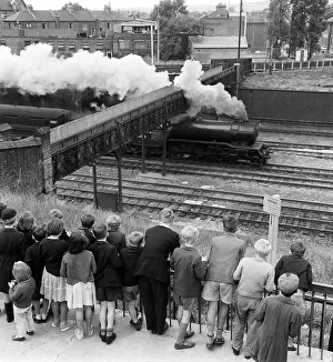 Another group of spotters in July 1960 gather at Finsbury Park on the East Coast Mainline