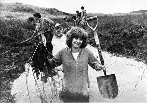 00054 Prints: A group of teenage conservation volunteers clear a Northberland nature reserve