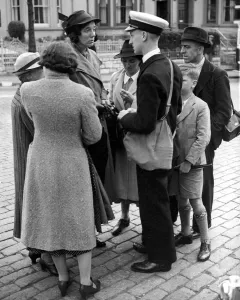 Emotions Prints: A group of women cluster eagerly around one of the rescued men from the British Royal