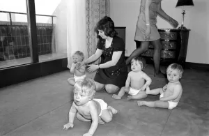 Nappies Prints: A group of young babies seen here getting cleaned up after getting into a mess with a