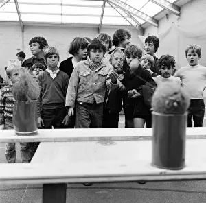 00898 Prints: Guisborough School fete, children playing on the coconut shy stall. 1972