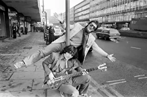 00502 Prints: Guitarist Gerry Cott (standing) and bass player Peter Briquette from the Boomtown Rats