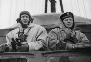 The Gunnery Officer and director layer in the Director Control Tower aboard the Polish