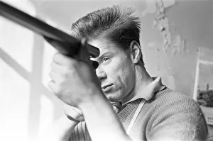 Shotgun Prints: Gunsmith inspecting the barrels for a shotgun in Birminghams Gun Quarter. Circa 1973