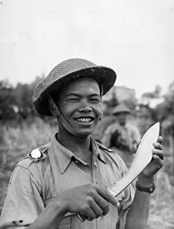 Knife Prints: A Gurkha infantryman armed with a kukri prepares for a night patrol. Italy