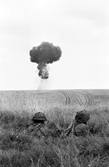 Gurkha Troops during a Nuclear Excercise - August 1962 take cover in long grass