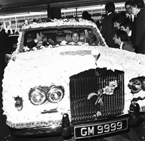 Religious Leaders Prints: Guru Maharishi 15 in flower covered Rolls Royce in 1973 The Divine Light on a visit