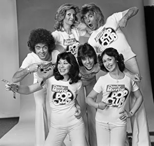 Guys N Dolls pop group wearing Daily Mirror Pop Club T-shirts 29th January 1976