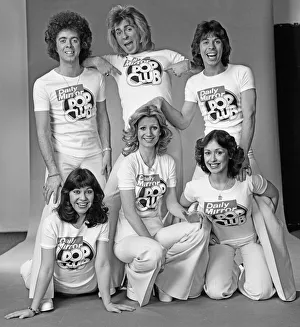 Guys N Dolls pop group wearing Daily Mirror Pop Club T-shirts 29th January 1976