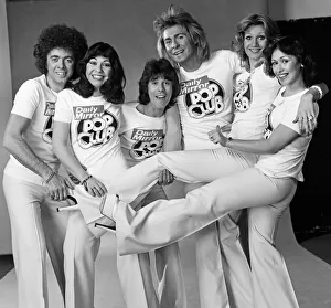 Guys N Dolls pop group wearing Daily Mirror Pop Club T-shirts 29th January 1976