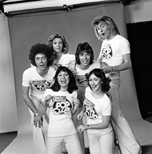 Guys N Dolls pop group wearing Daily Mirror Pop Club T-shirts 29th January 1976