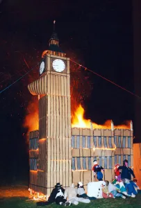 Big Ben Prints: Guys sit next to a bonfire modelled to look like the Houses of Parliament