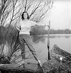 00845 Prints: Gwendolen Tulley poses with her rifle as she enjoys a shooting holiday, 1956