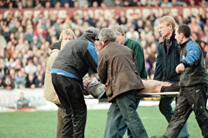 Gwyn Jones (number 7 ) is stretchered off the ground during the Cardiff verses Swansea