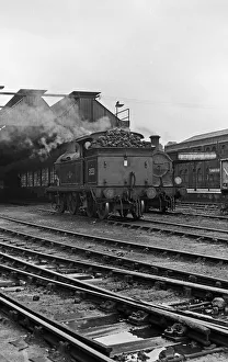 Tracks Prints: A H Class 0-4-4T locomotive seen here approaching the engine shed at Tunbridge Wells