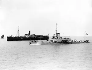 H. M. S. Cockchafer'dropping anchor at point where she picks up convoy